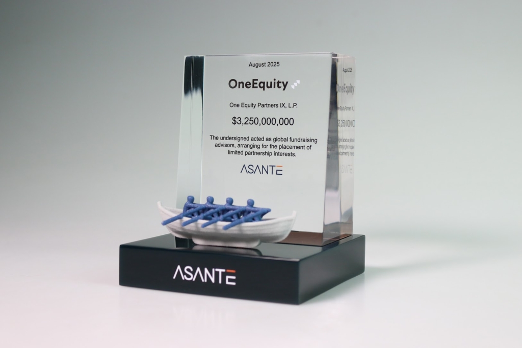 Acrylic financial tombstone celebrating One Equity Partners fundraising, featuring a symbolic rowing boat sculpture.