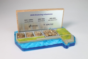 Custom fisheries investment deal toy with embedded coins and layered acrylic ocean design.