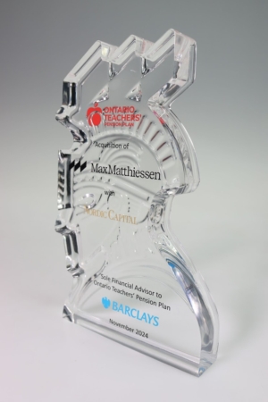 Clear acrylic financial tombstone marking Ontario Teachers’ Pension Plan acquisition of Max Matthiessen.